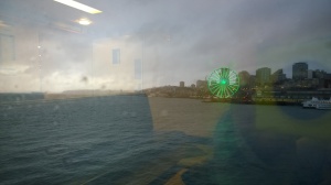 Managed to snap the picture of the Seattle Great Wheel with the unintentional effect showcasing the inside of the Washington State Ferry